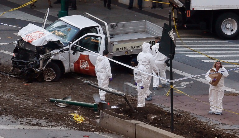 A motorist drove a Home Depot truck onto a bike path near the World Trade Center memorial, striking and killing several people Tuesday in New York. (AP Photo/Bebeto Matthews)