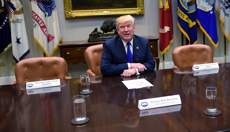 President Trump was flanked by two empty seats for Senate Minority Leader Sen. Chuck Schumer, D-N.Y., and House Minority Leader Nancy Pelosi, D-Calif., who decided not to attended a planned Tuesday meeting at the White House. (AP Photo/Susan Walsh)