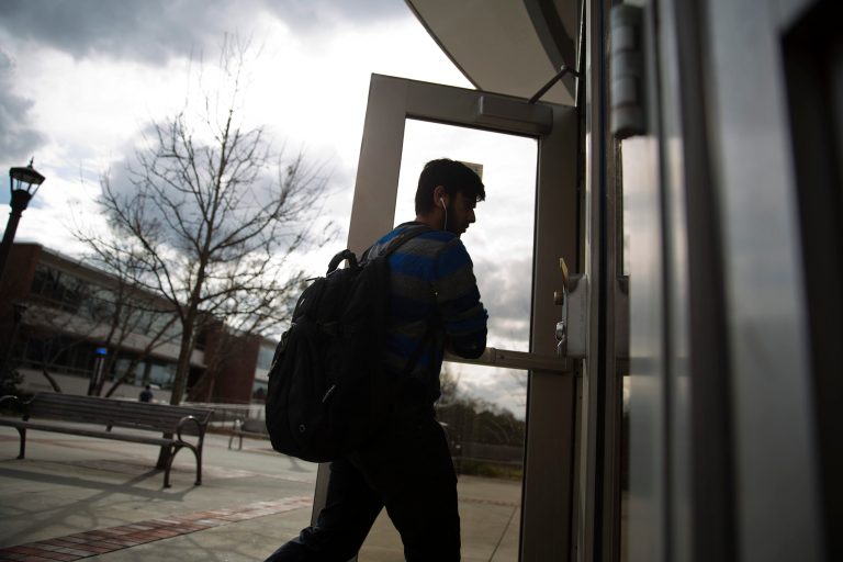 Why are colleges getting more and more involved in the personal lives of students? (AP Photo/David Goldman)
