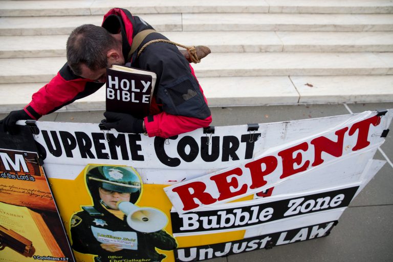 Alan Hoyle, of Lincolnton, N.C., stands outside the Supreme Court in Washington. (AP/ Evan Vucci)