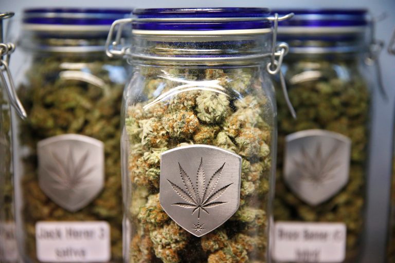 It's been a year since Colorado began allowing the sale of recreational marijuana and two important claims about successful legalization are increasingly being challenged. (AP Photo)