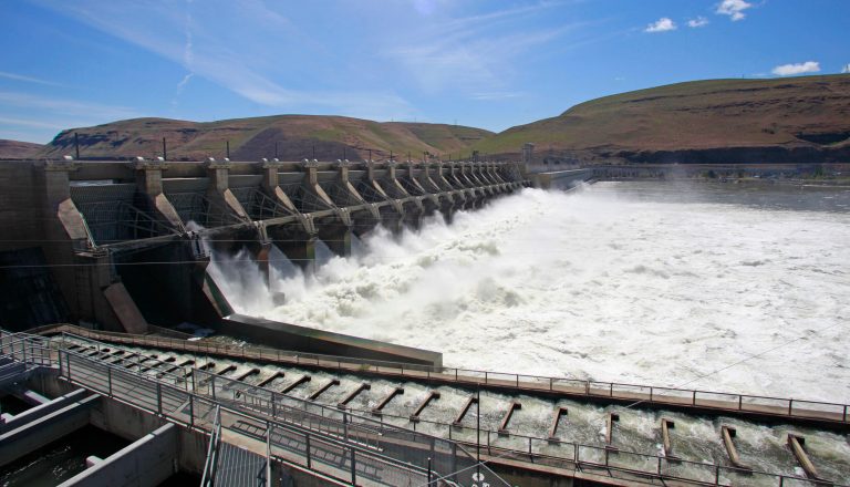 The John Day Dam, along the Columbia River, near Rufus, Ore., is pictured in June 2011. (AP Photo/Rick Bowmer)