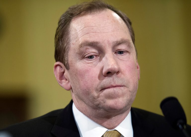 James Tuchschmidt, a top official at the Veterans Health Administration, the VA's health care arm, makes an opening statement while testifying before a House Veterans' Affairs Committee hearing on Capitol Hill in Washington, Tuesday, July 8, 2014. Tuchschmidt said he was sorry that VA employees have suffered retaliation after making whistleblower complaints. (AP Photo/Cliff Owen)