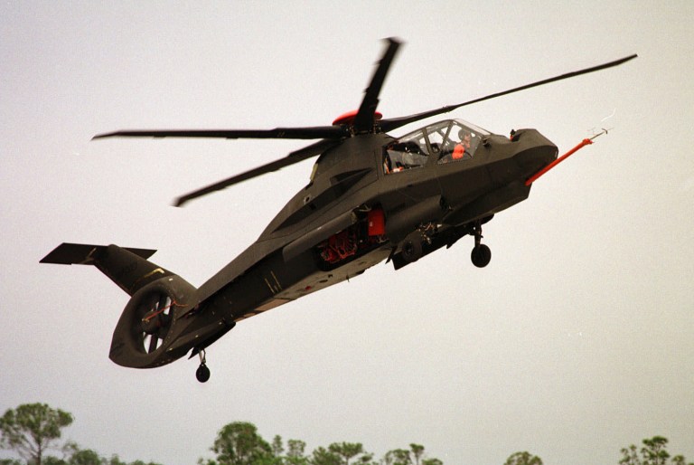 The RAH-66 Comanche reconnaissance/attack helicopter accounted for $9.8 billion of the total before the plug was pulled. (AP Photo/Phil Sandlin)