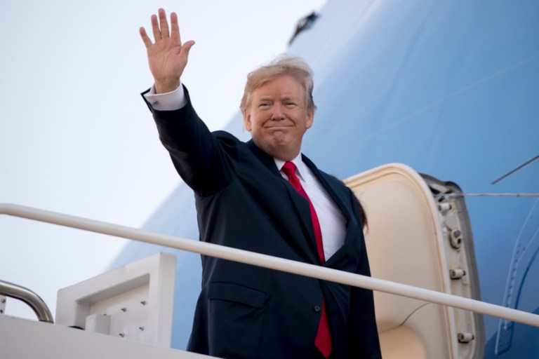 President Donald Trump waves as he boards Air Force One at Andrews Air Force Base, Md., Friday, Nov. 3, 2017, to travel to Joint Base Pearl Harbor Hickam, in Hawaii. Trump begins a 5 country trip through Asia traveling to Japan, South Korea, China, Vietnam and the Philippians. (AP Photo/Andrew Harnik)