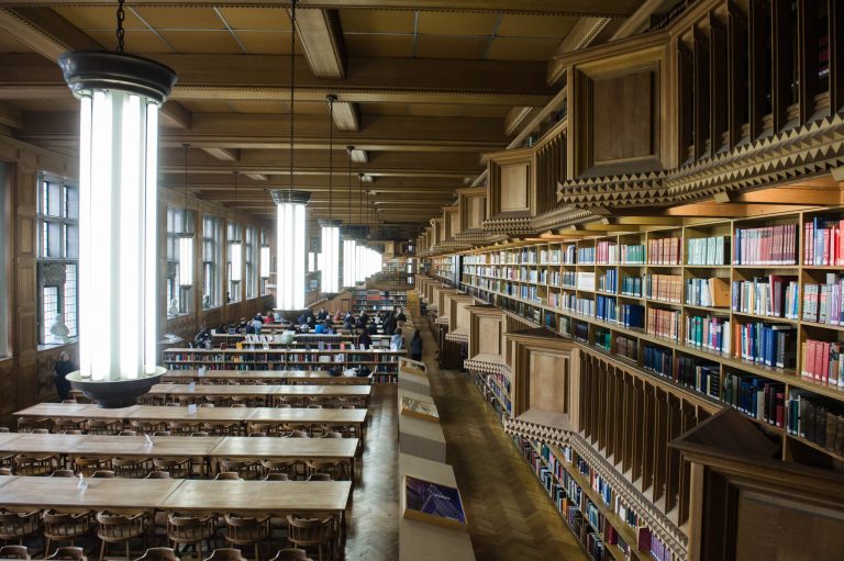In this picture taken on Monday, Jan. 6, 2014, the interior of the Leuven University Library in Leuven, Belgium. The German invading forces set the heart of Leuven alight during the early days of World War I, paying special attention to the gem of learning and history, the university library. The library was later rebuilt with donations coming from around the world. (AP Photo/Geert Vanden Wijngaert)