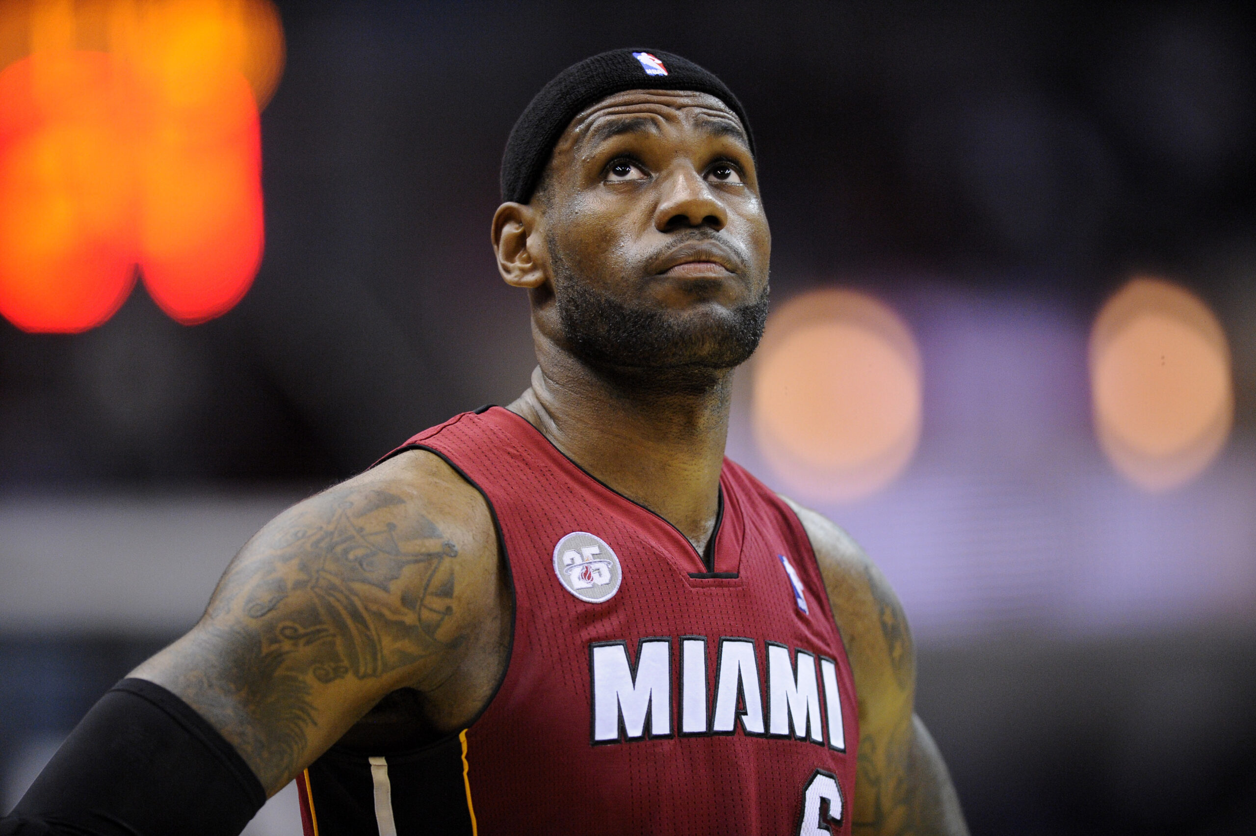 Wizards beat Heat 105-101 for 2nd win of season