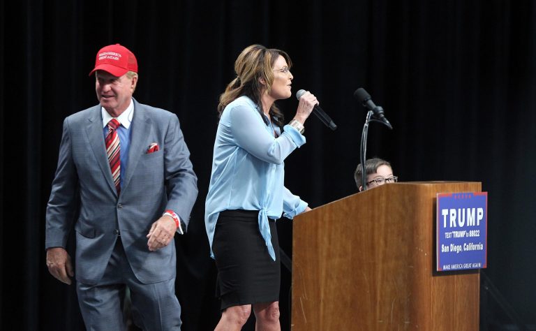 Former Republican vice presidential candidate Sarah Palin addresses the crowd after being introduced by Doug Manchester, left, at a campaign rally for Donald Trump on May 27, 2016, in San Diego. Trump named Manchester, a California hotelier, as his ambassador to the Bahamas in May. (John Gastaldo/The San Diego Union-Tribune via AP)