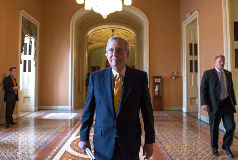 Senate Majority Leader Mitch McConnell, R-Ky., walks away after a policy luncheon on Capitol Hill in Washington, Tuesday, July 21, 2015. (AP Photo/Molly Riley)