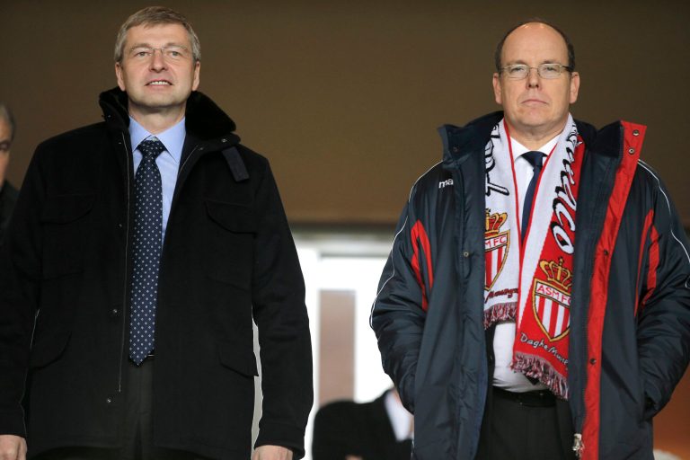 FILE - A Sunday, Jan. 26 , 2014 from files showing President of AS Monaco Dmitry Rybolovlev, left, and Prince Albert II Of Monaco, as they attend the French League One soccer match Monaco vs Marseille, in Monaco stadium. A Swiss court has ordered Russian billionaire Dmitry Rybolovlev to pay $4.5 billion to his ex-wife, in what could end up being the biggest divorce settlement in history. In papers delivered to the parties Monday, May 19, 2014, the Geneva Tribunal of First Instance said the 47-year-old Rybolovlev, a co-owner of the French soccer club AS Monaco, must pay 4,020,555,987.80 Swiss francs ($4,509,375,184.80) to ex-wife Elena Rybolovleva, also 47, of Geneva. The judgment shows that his wife also won two pieces of real estate in the ultra-wealthy area of Geneva known as Cologny, where the couple once lived together, and confirmed her custody of their 13-year-old daughter Anna. They also have an older daughter, Ekaterina, after meeting as university students in Perm, Russia, and marrying there in 1987. The divorce case began in 2008, when Forbes estimated his worth at $12.8 billion. (AP Photo/Lionel Cironneau)