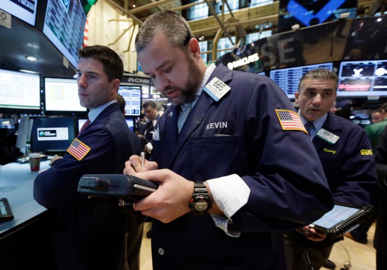 Stock futures were moving slightly higher Friday, as investors remain positive about the U.S. economic recovery going into the end of the year. (AP/Richard Drew)