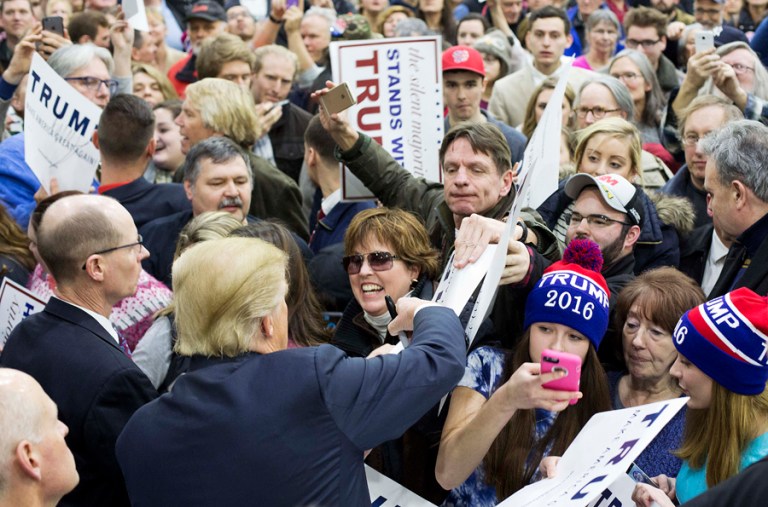 To those Americans who have struggled to pay the bills as they watch others get rich and bankroll politicians, Trump is the first candidate who makes them believe he'll fight for them. (AP Photo/David Goldman)