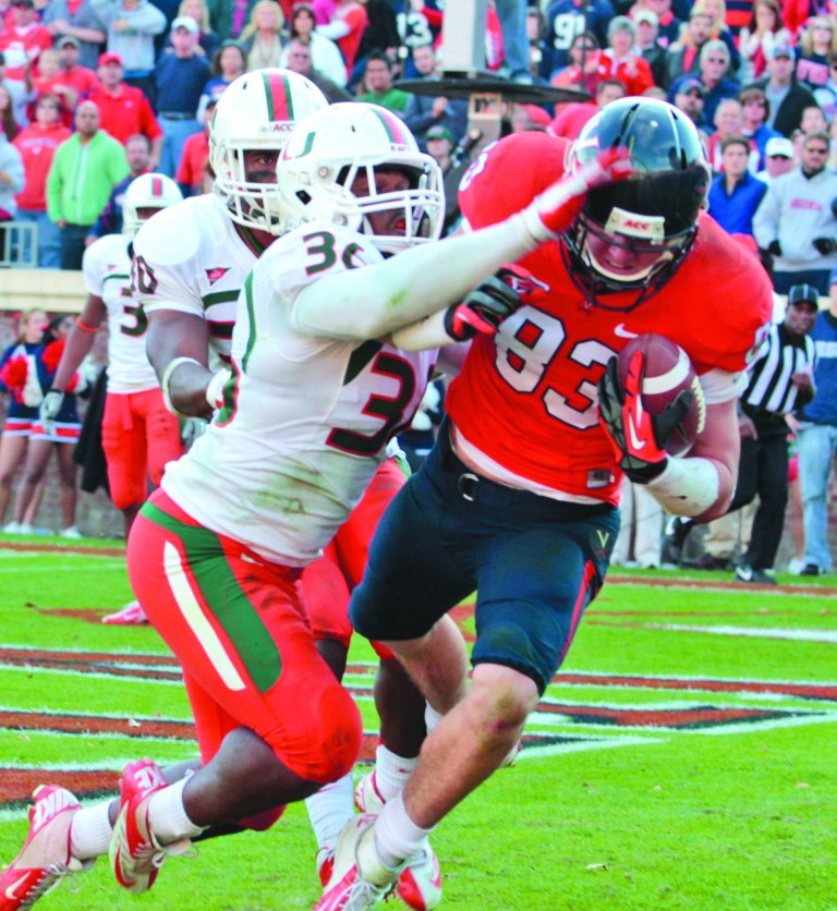 Steve Helber/AP
Jake McGee caught a 10-yard touchdown pass from Michael Rocco with six seconds left to give Virginia a victory over Miami on Saturday.