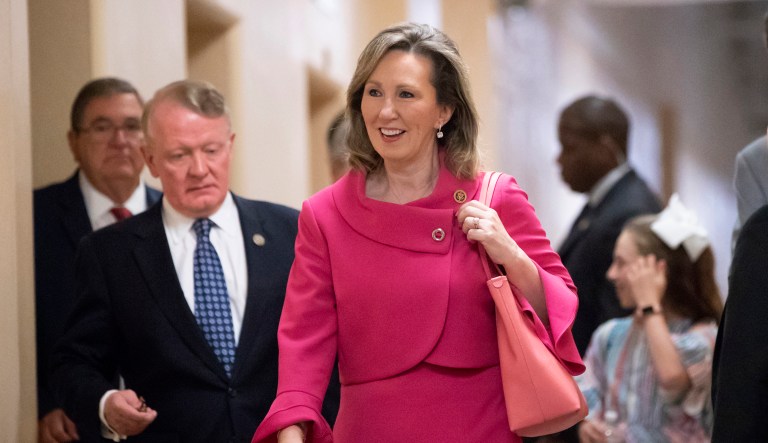 FILE - In this June 26, 2018, file photo, Rep. Barbara Comstock, R-Va., walks to a closed-door GOP strategy session at the Capitol in Washington. In Northern Virginia, violent crimes attributed to MS-13 have made the gang a focal point in the hotly contested race in the stateâs 10th Congressional District. But an ad by incumbent Republican Rep. Comstock criticizing her opponent Democratic state Senator Jennifer Wexton for failing to support anti-gang legislation falls short, according to The Associated Press.