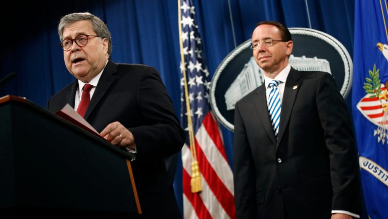 Attorney General William Barr speaks alongside Deputy Attorney General Rod Rosenstein, right, about the release of a redacted version of special counsel Robert Mueller's report during a news conference, Thursday, April 18, 2019, at the Department of Justice in Washington. 