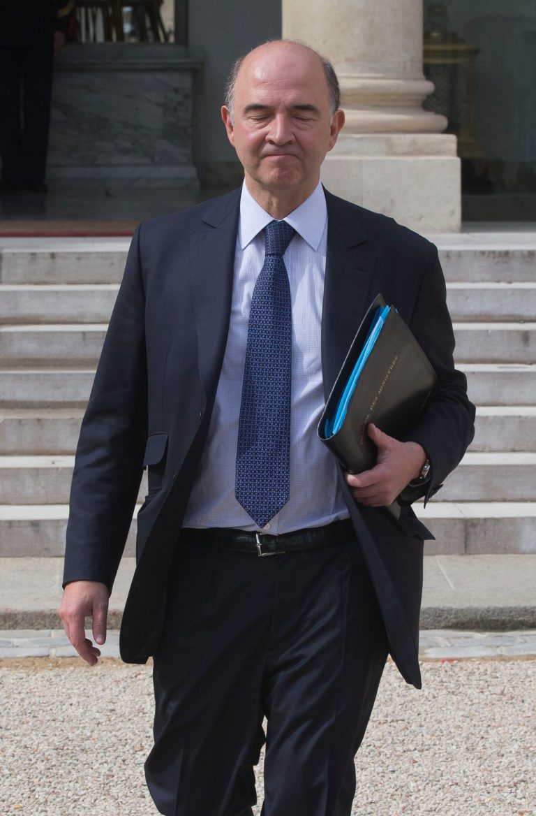French Finance Minister Pierre Moscovici, reacts as he walks toward the media after the weekly cabinet meeting in Paris, Wednesday, May 15, 2013. The French national statistics agency, Insee, said Wednesday that gross domestic product fell 0.2 per cent in the first quarter of the year, effectively moving France back into recession, and with eurozone's second-largest economy, the French economy is likely to exacerbate problems throughout the euro region.(AP Photo / Michel Euler)