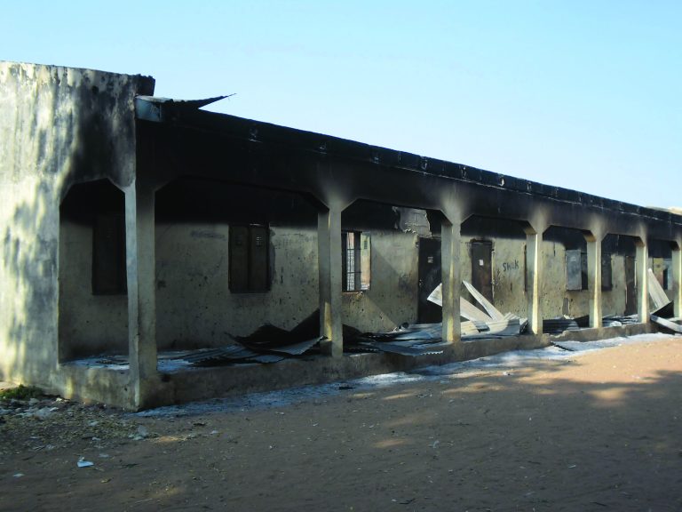 Burnt out school block following a gun battle and explosions by the Boko Haram sect in Potiskum, Nigeria, Saturday, Oct. 20 , 2012. A Chinese construction worker has been killed in a besieged city in Nigeria's northeast, an official said Friday, exacerbating security concerns for foreign workers in Nigeria's violence-wracked northeast, while an overnight raid in a nearby city left 5 others dead and several schools razed to the ground. (AP/Photo Adamu Adamu)