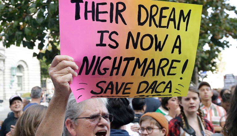Administration officials proposed a bill that would allow 1.8 million people eligible for the Deferred Action for Childhood Arrivals program to stay in the country. (AP Photo/Jeff Chiu)