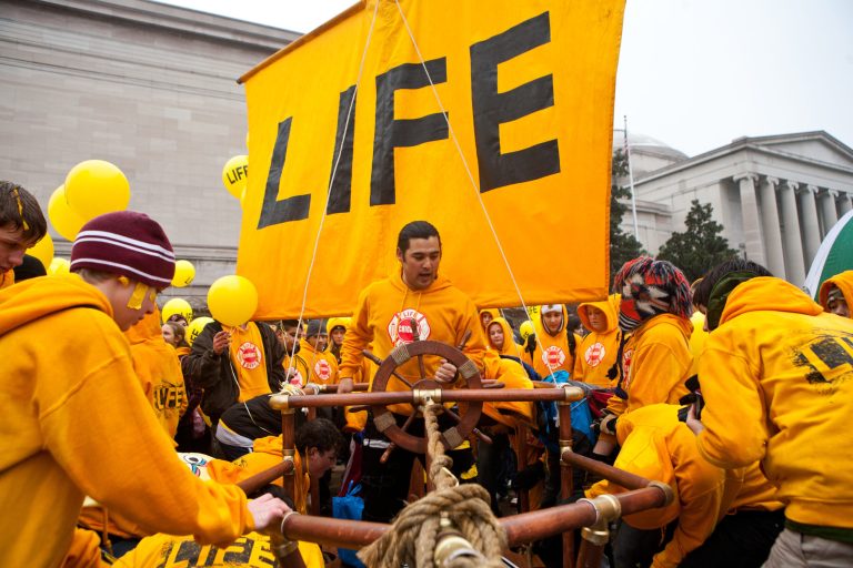 WASHINGTON, DC - JANUARY 23: Pro-life activists protest at the March for Life rally on January 23, 2012 in Washington, DC. Pro-life activists gather each year to protest on the anniversary of the Roe v. Wade Supreme Court decision that legalized abortion. (Photo by Brendan Hoffman/Getty Images)