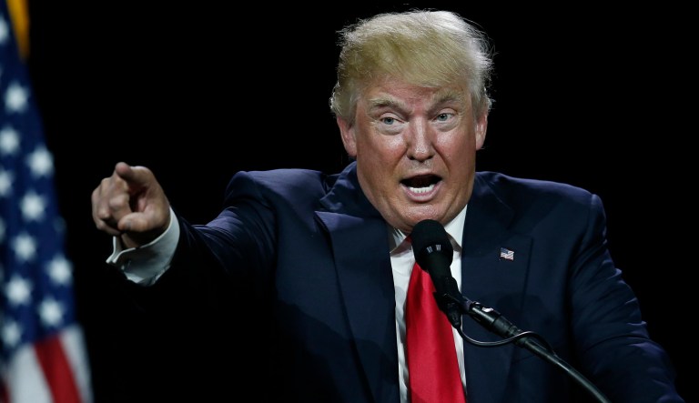 Trump posted a video earlier in the day showing him clotheslining CNN's logo. (AP Photo/David Zalubowski)