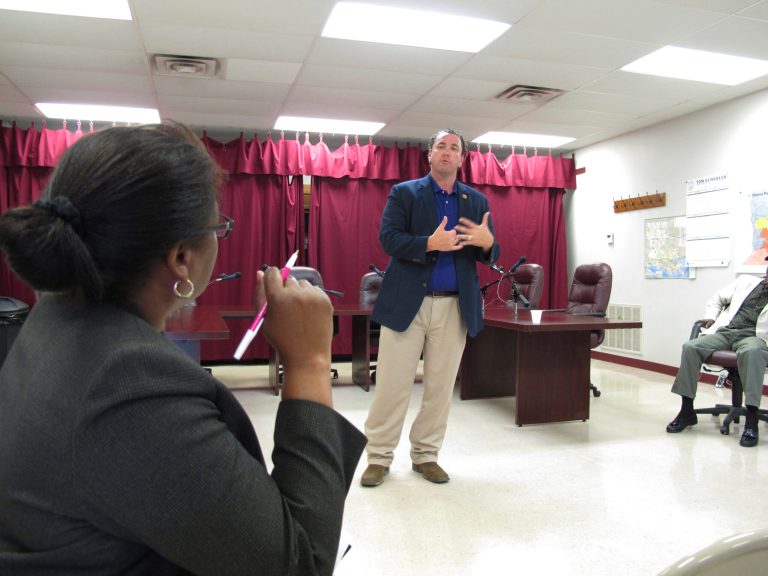 Rep. Vance McAllister answers questions from Virginia Bell, administrator for St. Helena Parish, at a sparsely-attended town hall meeting, in Greensburg, La., last month. (AP/Melinda Deslatte)