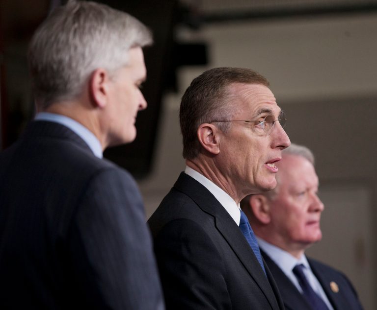 Rep. Tim Murphy, R-Pa., center, flanked by Rep. Leonard Lance, R-N.J., right, and Rep. Bill Cassidy, R-La., speaks about the introduction of a legislative package of major mental health reforms. (AP Photo/Pablo Martinez Monsivais)