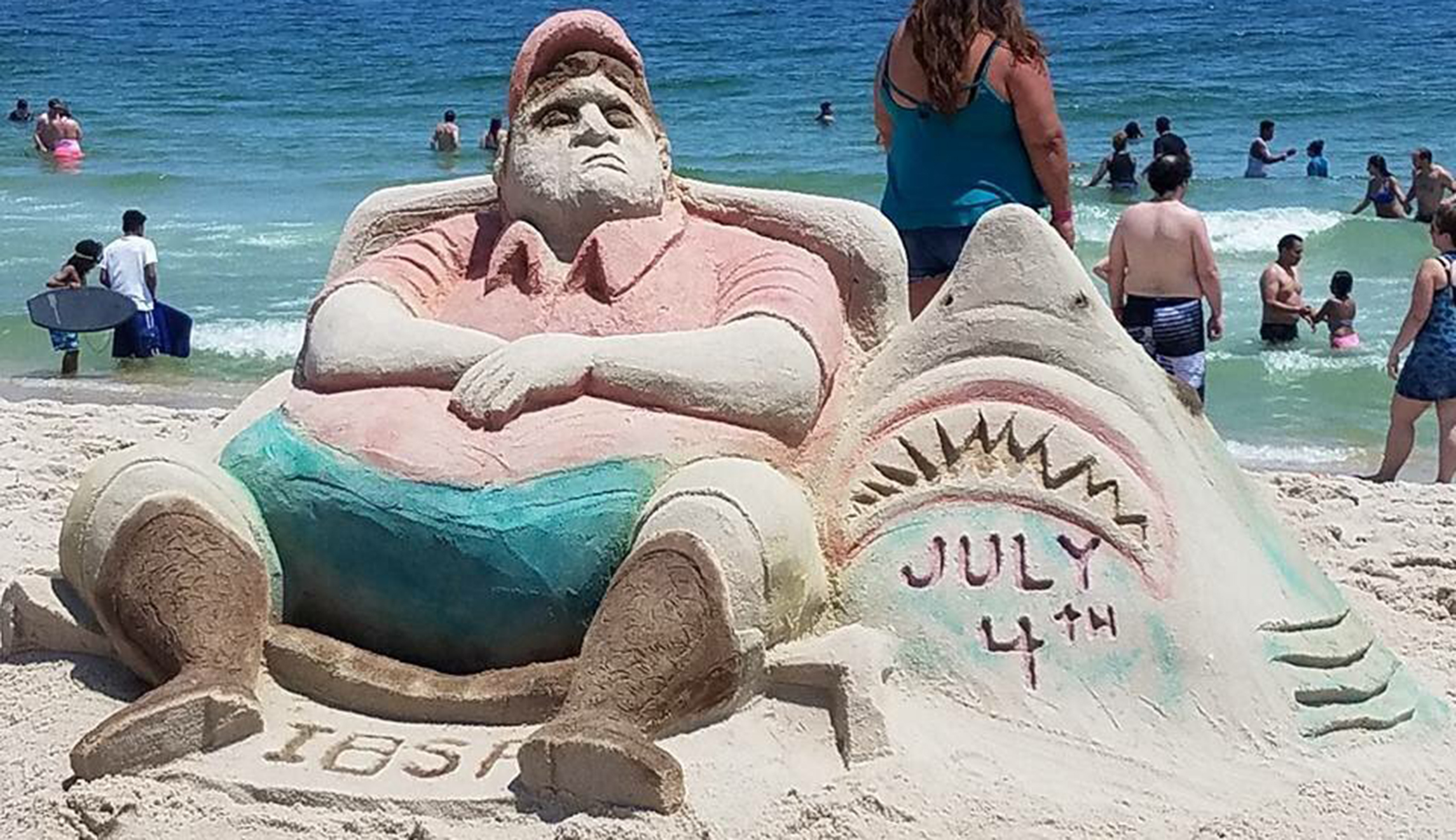 Artists recreate Chris Christie’s beach outing in sand sculpture