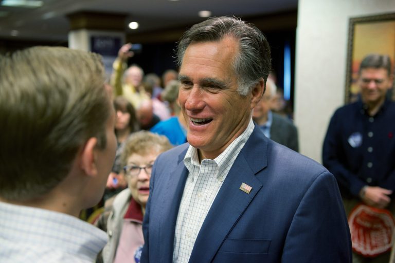 Former Massachusetts Gov. and GOP presidential candidate Mitt Romney makes his way through supporters of Joni Ernst on Oct. 11, 2014 in Cedar Rapids, Iowa. (Photo by David Greedy/Getty images)