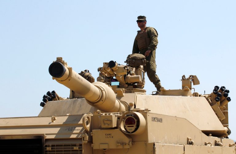 A Pew survey of some 2,000 Americans shows 51 percent believe that the U.S. does too much in helping solve world problems. (AP File)