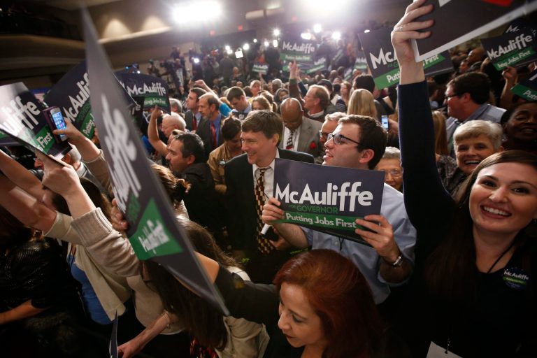 Supporters cheer as they watch the results on television at the election night party for Democratic gubernatorial candidate Terry McAuliffe in Tysons Corner, Va. (AP Photo/Alex Brandon)