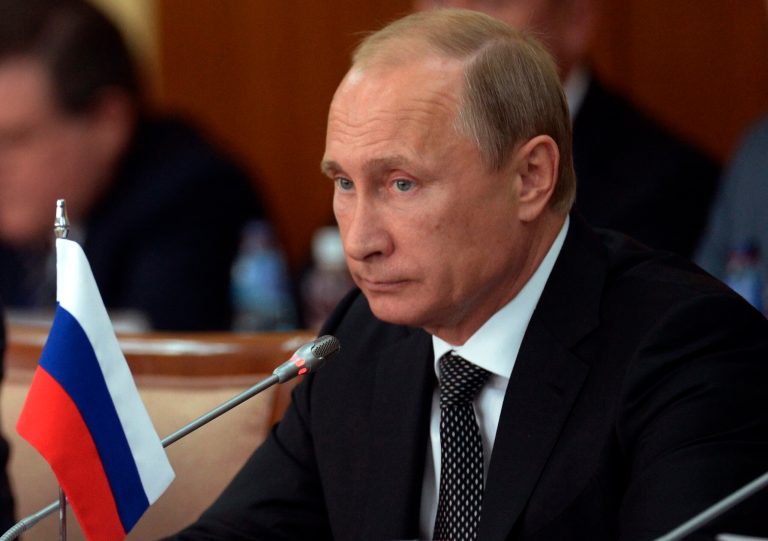 Russian President Vladimir Putin listens during Russian-Mongolian talks at the State Palace in Ulan Bator, Mongolia, on Wednesday. (AP Photo/RIA Novosti, Alexei Nikolsky)