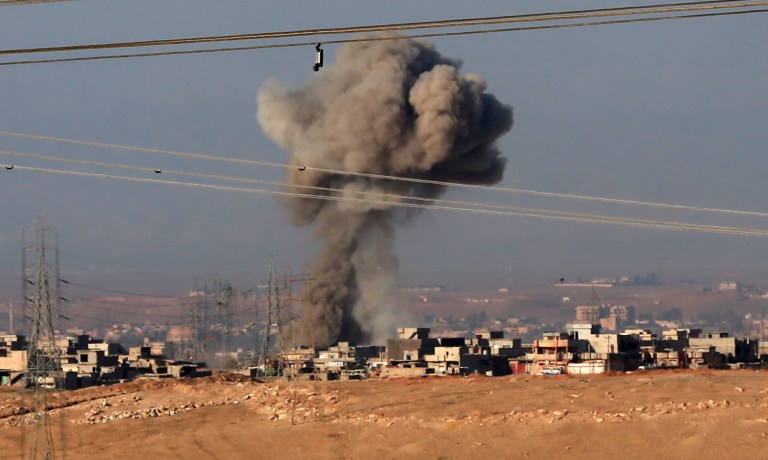 The U.S. had also dropped leaflets in recent days, warning the forces they were inside a well-established de-confliction zone, and needed to retreat. (AP Photo/ Khalid Mohammed)