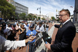 Steve Lonegan took to the steps of Newark City Hall to announce a lawsuit against Cory Booker, but the event quickly deteriorated into a shouting match between Newarkers who dislike Cory Booker and those who dislike Steve Lonegan. Thursday September 5, 2013. Newark, NJ, USA. Aristide Economopoulos/The Star-Ledger 