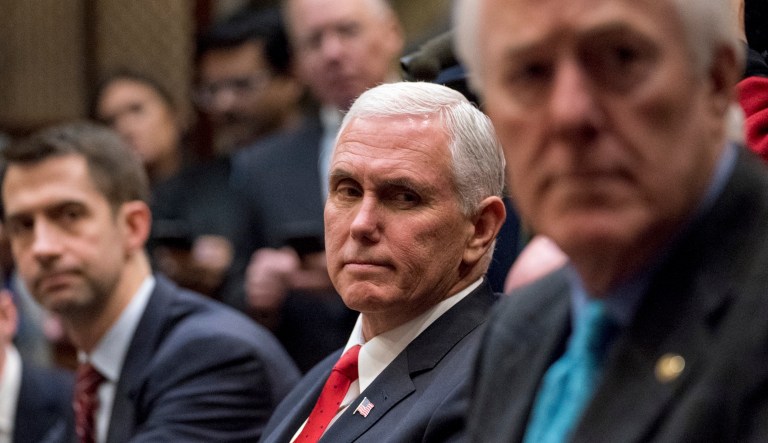 Vice President Mike Pence joined senators Wednesday to cast a tie-breaking vote confirming Kansas Gov. Sam Brownback to be at-large ambassador for international religious freedom, against Democrat objections. (AP Photo/Andrew Harnik)