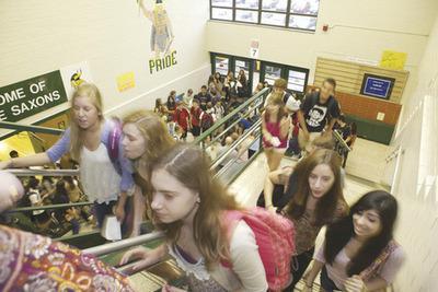 Students had to contend with a dreary, rain-filled day on the first day of school at Langley High School in Fairfax County.-Graeme Jennings/Examiner