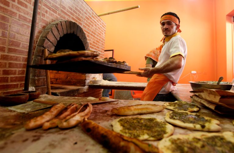 In this Tuesday, June 11, 2013 photo, an employee works at 