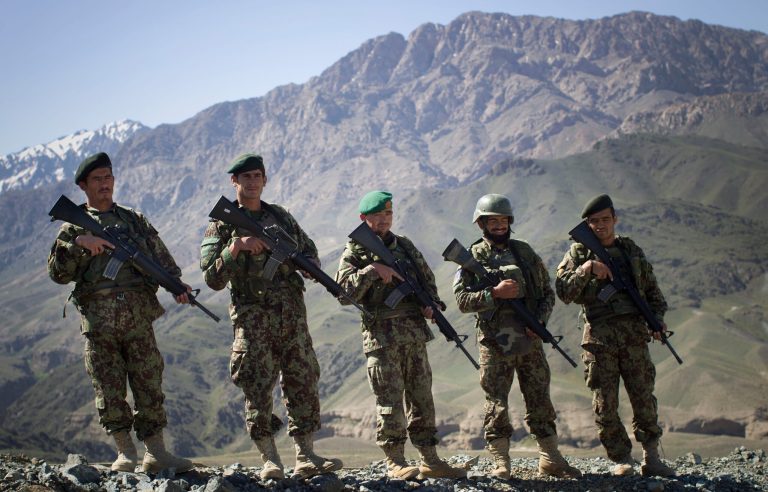 Afghan National Army soldiers stand together for a picture.