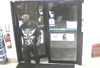 Police looking for armed robber who stole cigarettes