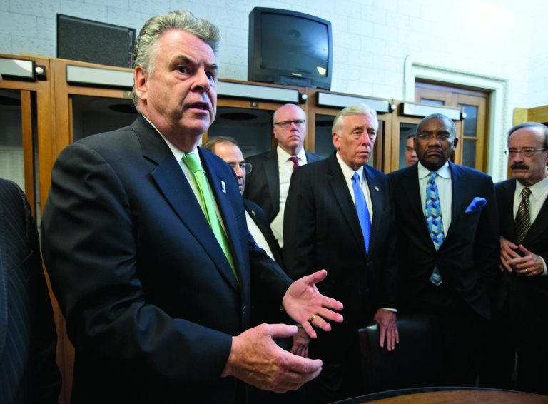 Rep. Peter King, R-N.Y., left, joined by other New York area-lawmakers affected by Superstorm Sandy, express their anger and disappointment after learning the House Republican leadership decided to allow the current term of Congress to end without holding a vote on aid for the storm's victims, at the Capitol in Washington, early Wednesday, Jan. 2, 2013. (AP Photo/J. Scott Applewhite)