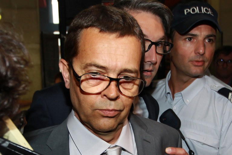 FILE - In this June 11, 2014 file photo, former Bayonne's hospital doctor Nicolas Bonnemaison arrives at the courthouse of Pau, southwestern France, for the first day of his trial on poisoning charges, for having given lethal injections to help seven terminally ill patients die. Simultaneously,  Europe's top human rights court ordered doctors to continue treatment for a man left comatose after a car accident six years ago, overruling a French panel in a highly unusual late-night decision.  (AP Photo/Bob Edme, File)