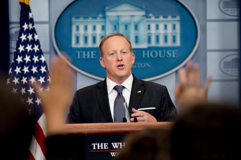 Spicer evaded several questions, including whether Trump believes that climate change is a hoax. (AP Photo/Andrew Harnik)