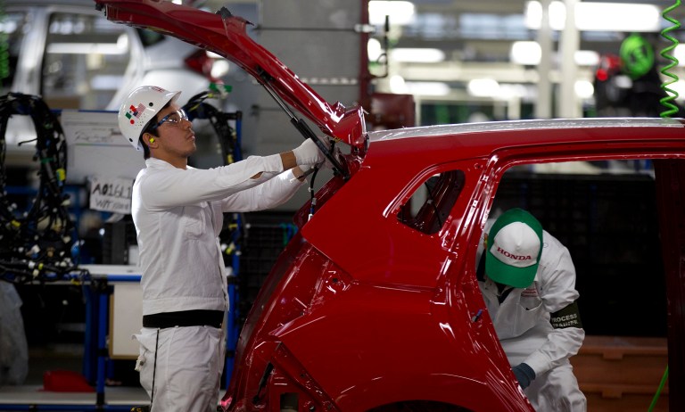 Foreign investment and increased specialization have led to real growth in the U.S. auto industry even as domestic companies expand their operations around the world. (AP Photo/Eduardo Verdugo)