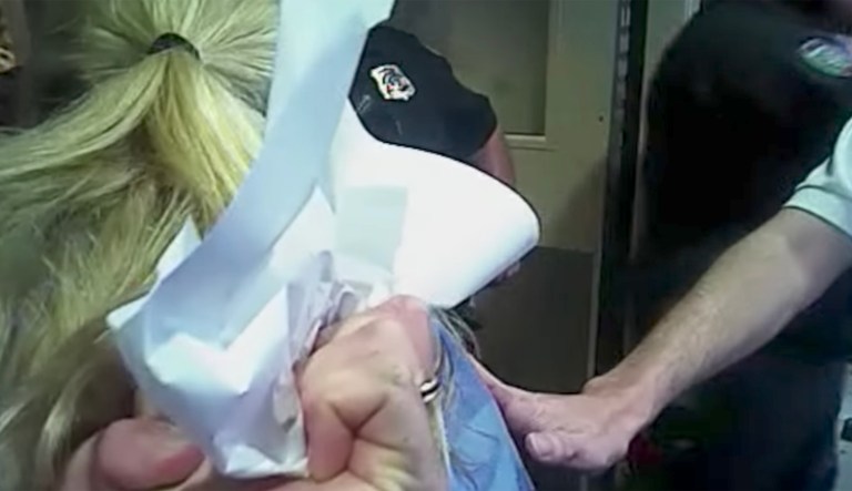 Video footage from police officers' body cameras taken during the July 26 incident showed the nurse and detective engaged in a back-and-forth. (Screengrab)