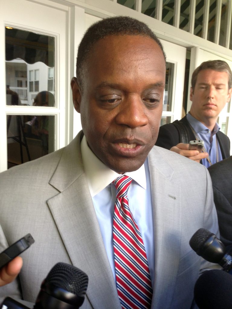 Detroit emergency manager Kevyn Orr speaks with reporters after addressing the Mackinac Policy Conference on Friday, May 30, 2014 on Mackinac Island, Mich. Orr said city retirees and workers considering a deal to cut their pensions risk much steeper reductions if they make a 