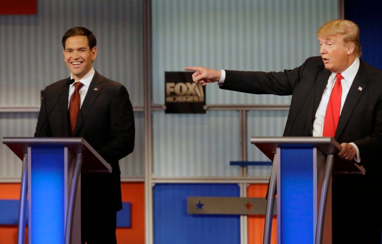 Donald Trump has sided with Marco Rubio, as the battle between the Florida senator and Ted Cruz continues to rage on over the NSA's bulk collection of metadata. (AP Photo/Jeffrey Phelps)