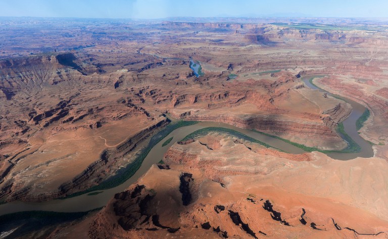 FILE - This May 23, 2016, file photo, shows the northernmost boundary of the proposed Bears Ears region, along the Colorado River, in southeastern Utah. President Donald Trump signed an executive order Wednesday, April 26, 2017, directing his interior secretary to review the designation of dozens of national monuments on federal lands, as he singled out "a massive federal land grab" by the Obama administration.