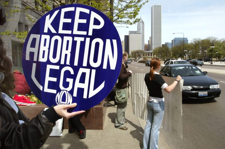 CHICAGO - MAY 5:  Demonstrators protest during a rally against the Pro-Life Action League outside Roosevelt University May 5, 2004 in downtown Chicago, Illinois. The demonstrators, supported by an ad-hoc group of concerned Chicago Columbia College students and staff, called the event a pro-choice mobilization against the Pro-Life Action League. The Pro-Life Action League was to have shown up, but did not.  (Photo by Tim Boyle/Getty Images)