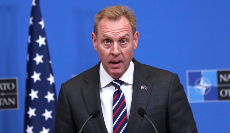 Acting Defense Secretary Patrick Shanahan talks to journalists during a press conference at the second day of a NATO defense ministers meeting at NATO headquarters in Brussels, Thursday, Feb. 14, 2019.