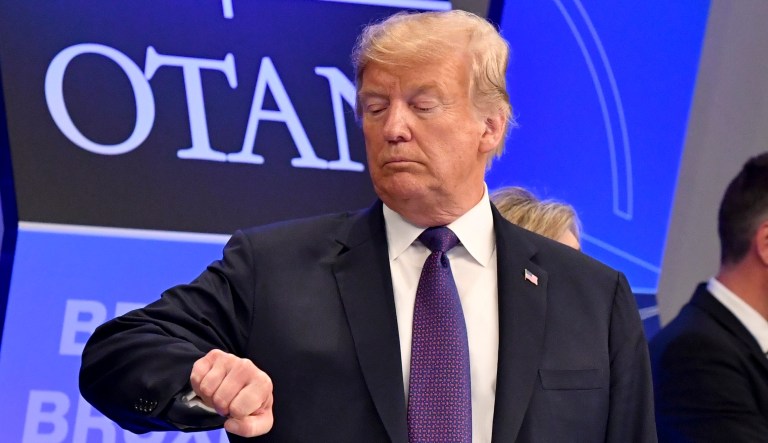 President Trump checks the time at the Art and History Museum at the Park Cinquantenaire in Brussels on July 11, 2018.
