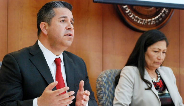 File - In this April 15, 2019 file photo, U.S. Reps. Ben Ray LujÃ¡n, left, and Debra Haaland of New Mexico speak at a field hearing of a House Subcommittee on Energy and Mineral Resources in Santa Fe, N.M., about the affects of air pollution on sacred Native American cultural sites.